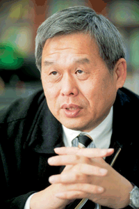 勞委會副主委潘世偉認為政府大量運用派遣乃受限於公務員額管制,雖有「調節閥」功能,仍應檢討。(攝影/莊坤儒)